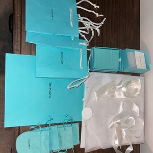 Tiffany boxes , tissue paper, ribbons ,pouches,gift bags
